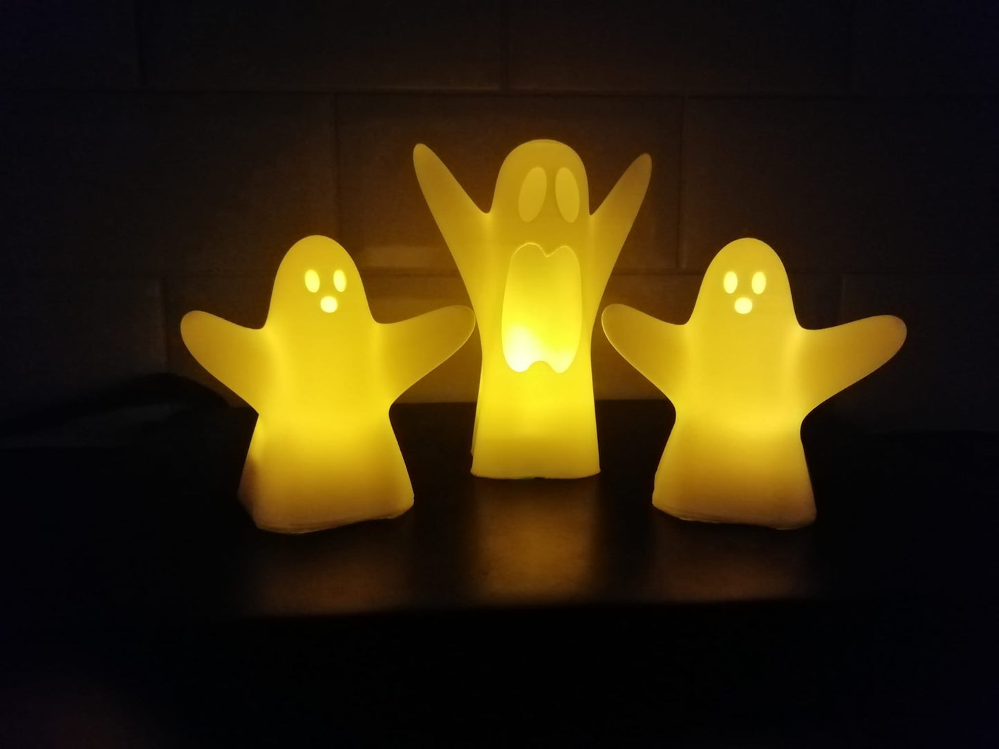 Halloween Ghost Tealight covers Warm white LED lights included.