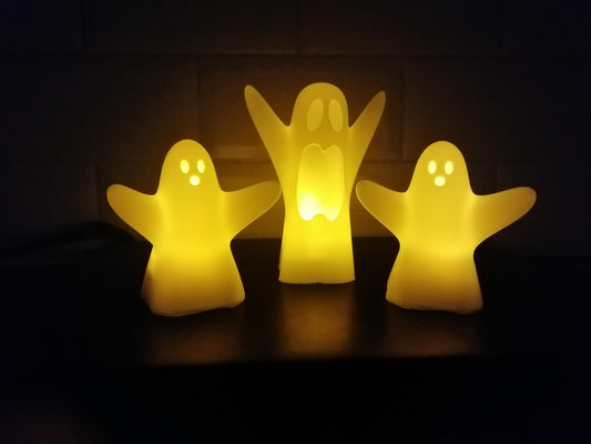Halloween Ghost Tealight covers Warm white LED lights included.